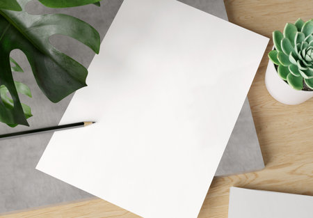 Blank paper on light wooden desk Mockup. 3d rendering of A4 empty white sheet on concrete plate with...