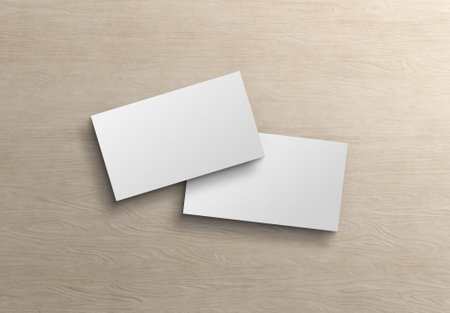 Two white US business card Mockup. American size calling card front and back on wood surface 3D renderingの写真素材