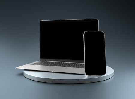 PARIS - France - March 20, 2025: Apple Macbook Air and Iphone 16. 3d rendering laptop and mobile phone mockup on silver displayの写真素材