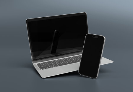 PARIS - France - March 20, 2025: Apple Macbook Air and Iphone 16, Silver color. Side view. 3d rendering laptop mockup floating on gray backgroundの写真素材
