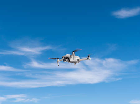 Drone flying against the skyの写真素材
