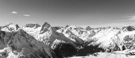 Panorama of winter snowy mountains in Caucasus region, Russiaの写真素材