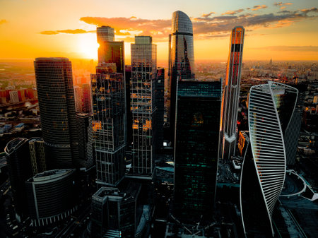 Skyscrapers of Moscow City business centre at sunset. Aerial view of Moscow city skyline and skyscraper buildingの写真素材