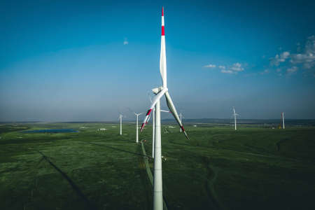 Wind Turbines Windmill Energy Farm with blue skyの写真素材