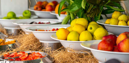 Fresh apples from farm on the table in buffet fruit lineの写真素材