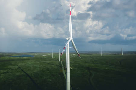 Wind Turbines Windmill Energy Farm with blue skyの写真素材