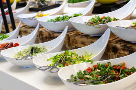 Salad bar with fresh vegetables in buffet in all inclussive hotelの写真素材