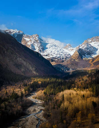 autumn weather in a mountain gorge against a blue beautiful skyの写真素材