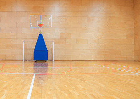 Basketball sports hall with a mobile movable basket and goals for mini-footballの写真素材