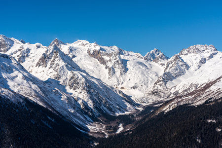 Panorama of winter snowy mountains in Caucasus region, Russiaの写真素材