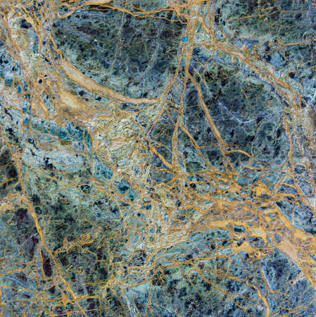 Palace marble texture with beautiful shades of green and goldの写真素材