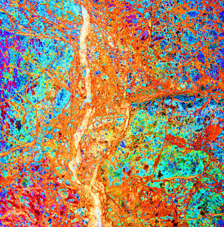 Abstract marble-like texture in bright toxic colorsの写真素材