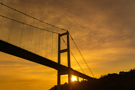 Cable-stayed bridge across the Bosphorus at sunsetの写真素材