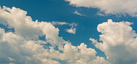 amazing blue backgrounds a lot of cloudsの写真素材