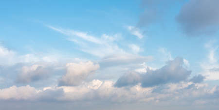 amazing blue sky background with clouds and light hazeの写真素材