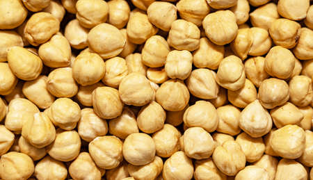 Hazelnut peeled kernels in light shades. Close-up, textureの写真素材