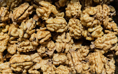 Peeled walnut grains close up for backgroundの写真素材