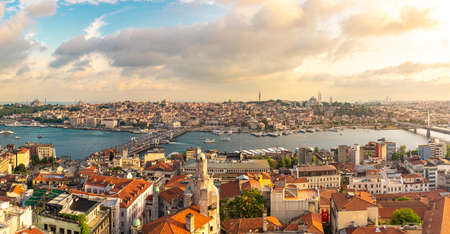 Panoramic view of Istanbul skyline with Golden Horn strait at sunsetの写真素材
