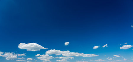 Panorama of blue sky with white clouds in clear weatherの写真素材