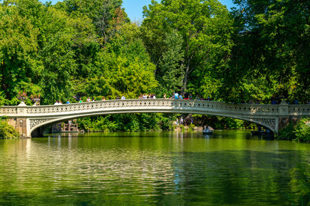 19.09.2022 Central Park, Bow Bridge, New York, NY 10024, USA Bow Bridge People are walking on the bridgeのeditorial素材