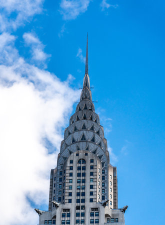 New York City, United States - September 20, 2022. The spire of the Chrysler building against a blue cloudy skyのeditorial素材