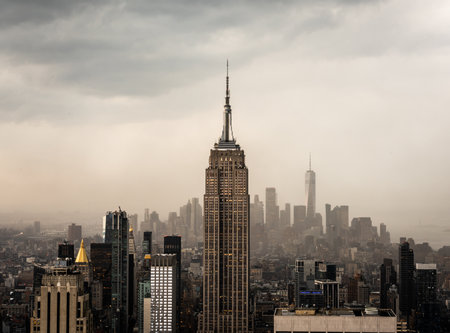 View of a lonely skyscraper in retro style with a dramatic skyの写真素材