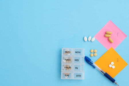 Recording the frequency of taking medications during the week on stickersの写真素材