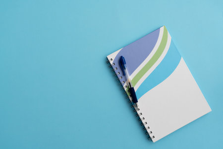 Notebook and pen on the table as a concept of readiness for study and businessの写真素材