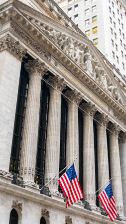 New York, USA - September 19, 2022: US national flags on the New York Stock Exchange building on Wall Streetのeditorial素材