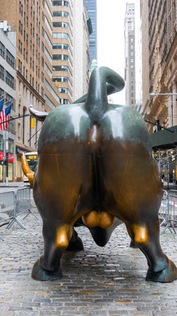 New York City, United States - September 19, 2022 The rear view of the Bull in Lower Manhattan represents the growth of economic indices and the US economyのeditorial素材