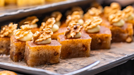 Nut cakes with honey for breakfast lie on a trayの写真素材