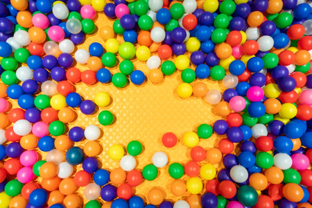 A cheerful and colorful ball pit perfect for kids fun and playtime.の写真素材