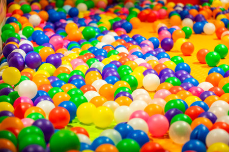 A lively ball pit filled with colorful plastic balls for endless fun and exploration.の写真素材