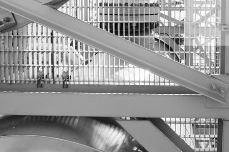 Detailed view of an industrial metal framework showcasing engineering precision and functional durabilityの写真素材
