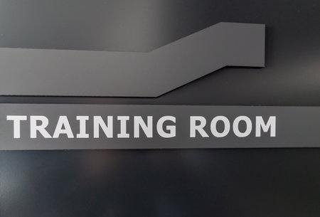 Modern training room sign on a dark door in a corporate or educational facilityの写真素材