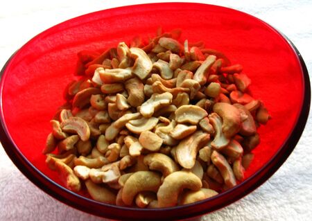 Red Bowl of cashew nuts Red Bowl of cashew nuts
