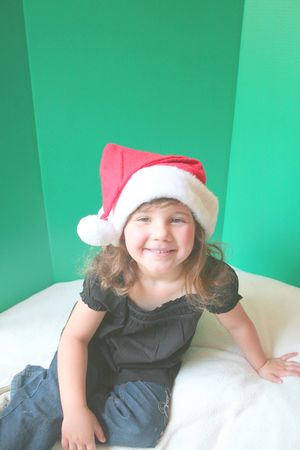 Cute little girl in santa hatの写真素材
