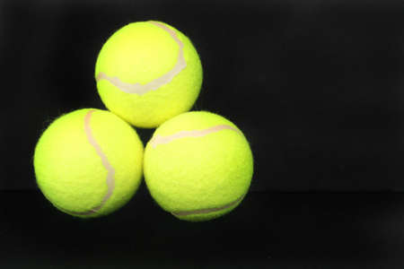three yellow tennis ballsの写真素材