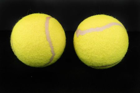 Two yellow tennis ballsの写真素材