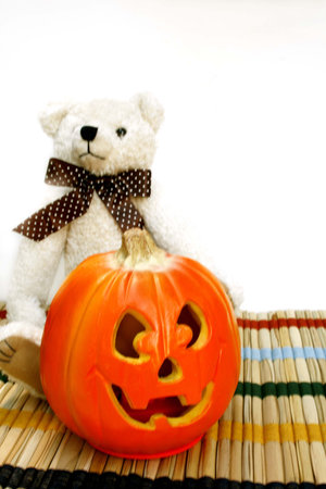 Teddy bear with Jack O Lanternの写真素材
