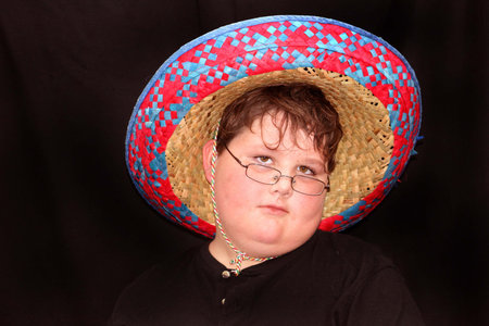 Young boy wearing mexican hatの写真素材