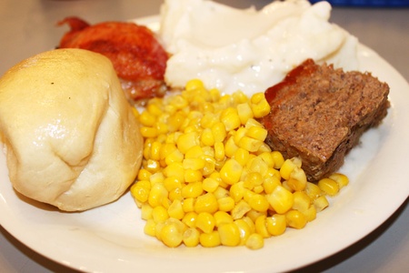 Lunch of mashed potatoes, meatloaf, and  rolls  の写真素材