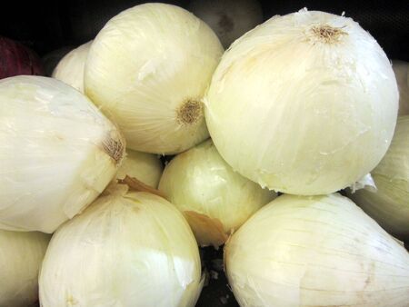 box of fresh white onionsの写真素材