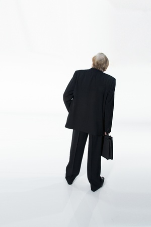 Stressed old business man white backgroundの写真素材