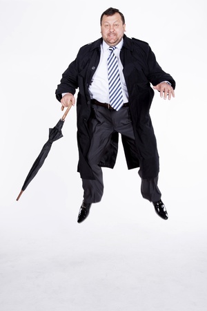 silhouette caucasian business man expressing winning winner energy success full length on studio isolated white backgroundの写真素材