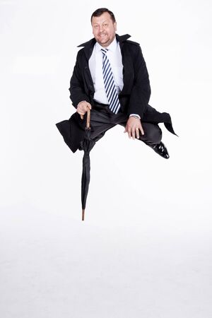 silhouette caucasian business man expressing winning winner energy success full length on studio isolated white backgroundの写真素材
