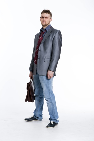 Young business man on his way to work, rest, talking, sitting, reflectsの写真素材