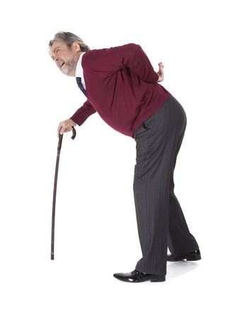 Full length portrait of old man with a caneの写真素材