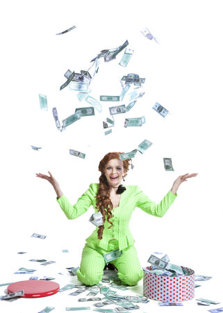 Happy woman throwing money on a white 