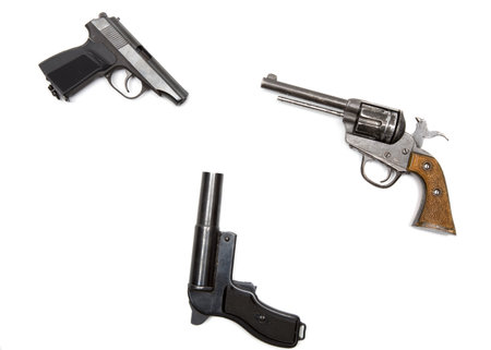 three pistols on white background